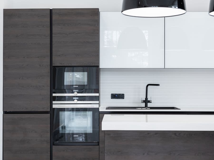 A remodeled modern kitchen with new cabinets and countertops — local home-service work